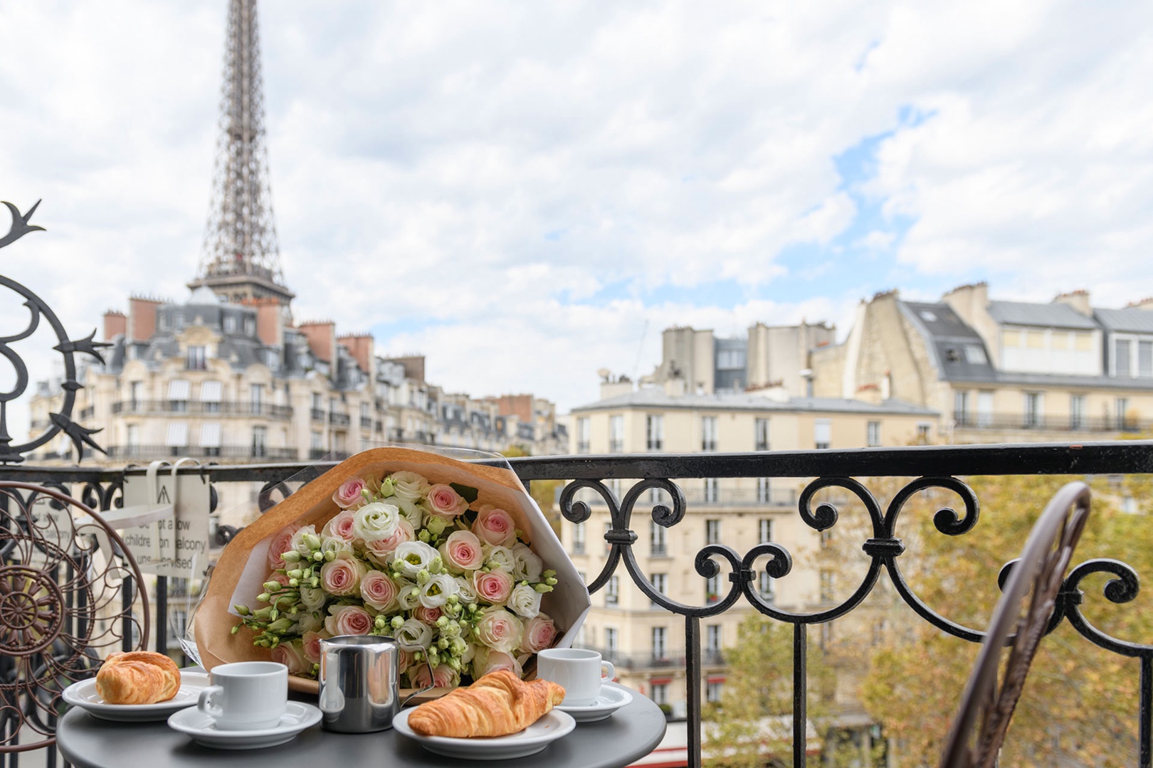 Have an al fresco breakfast on your balcony with stunning Eiffel Tower views!