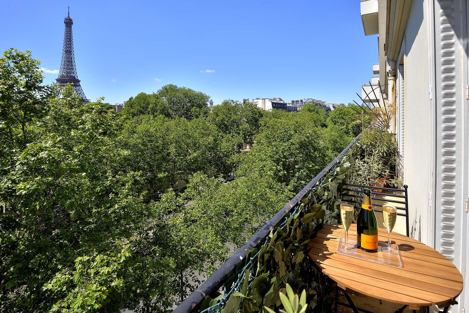 The tower rises from the lush greenery during spring and summer.