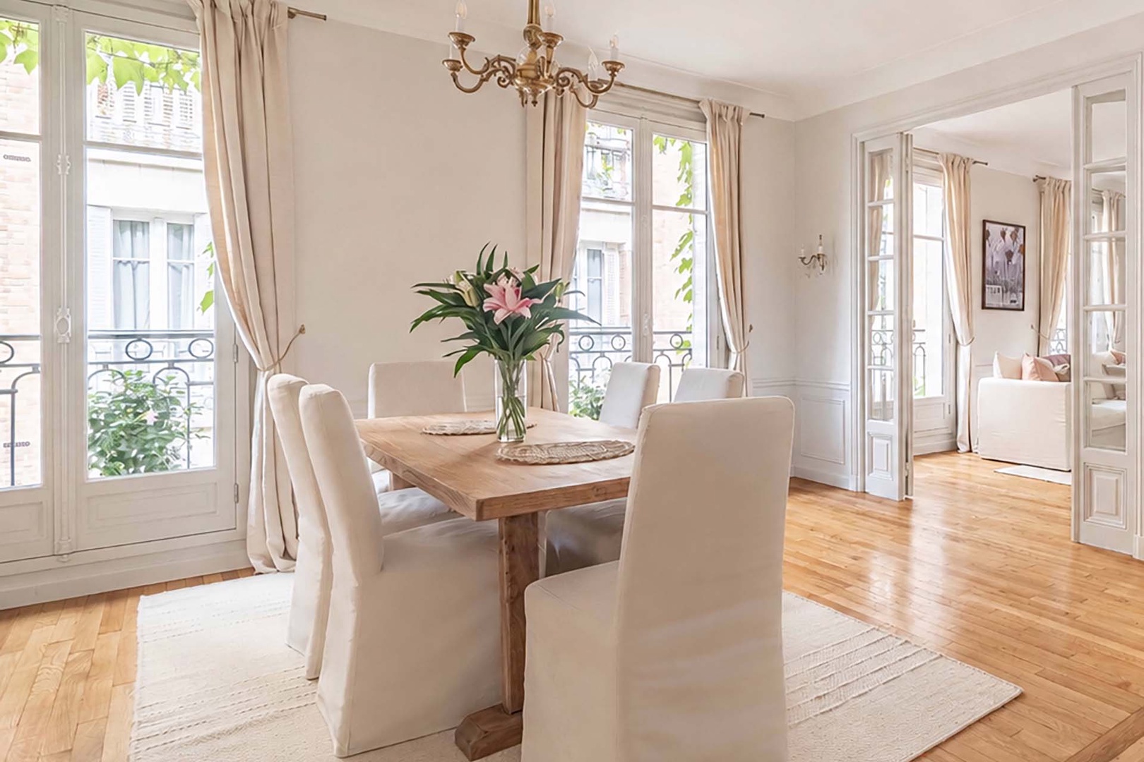 Glass-paned doors can be closed to separate the spaces.