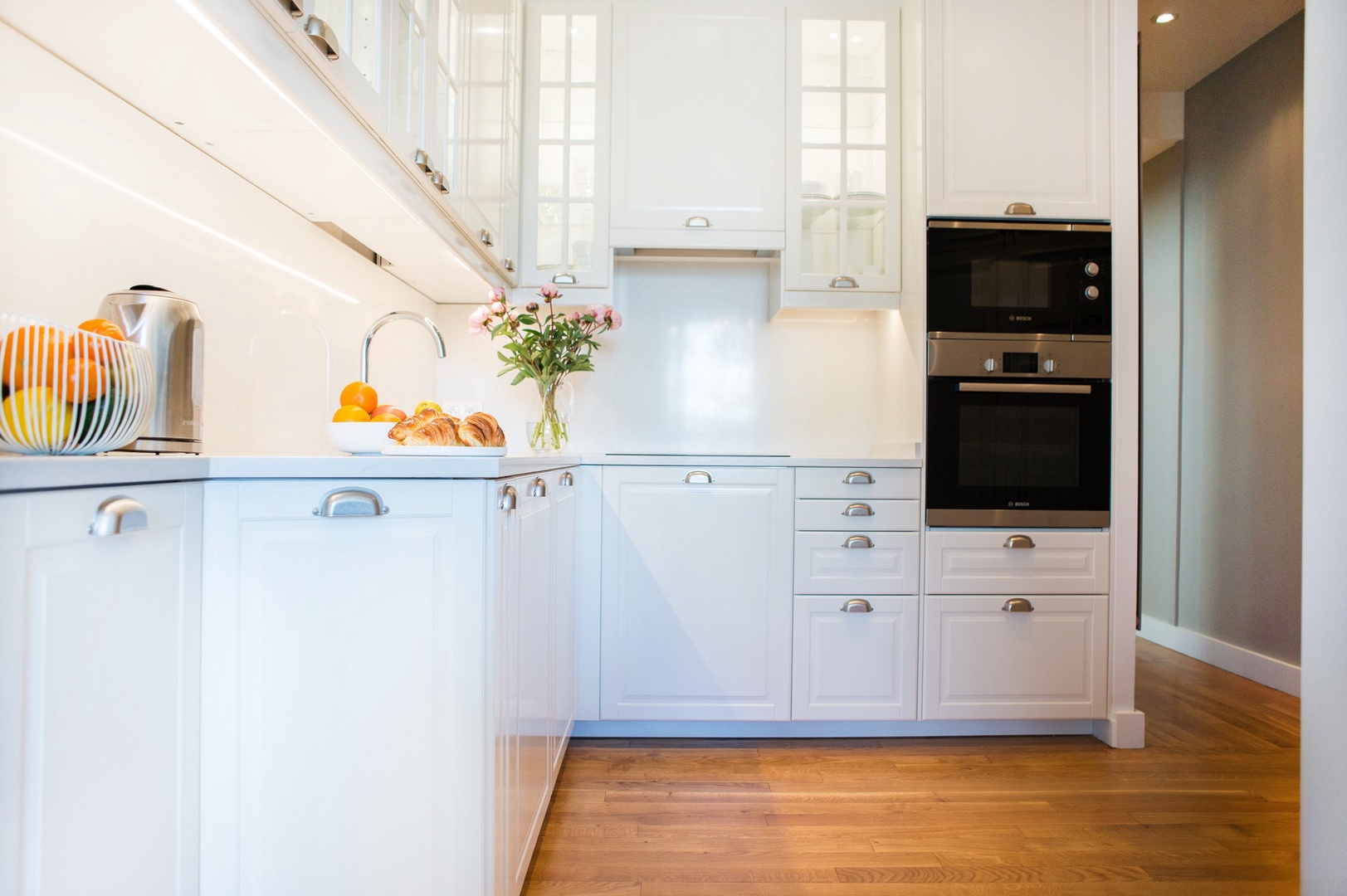 Walk through the kitchen to the bedrooms and bathrooms.