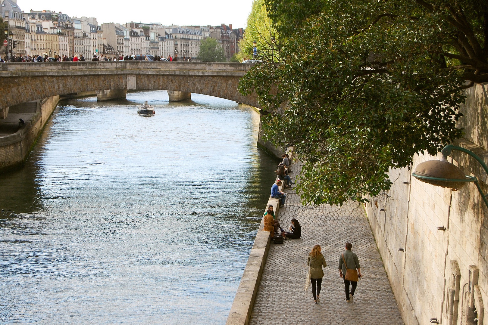 Stroll along the Seine and take in the Parisian sights.