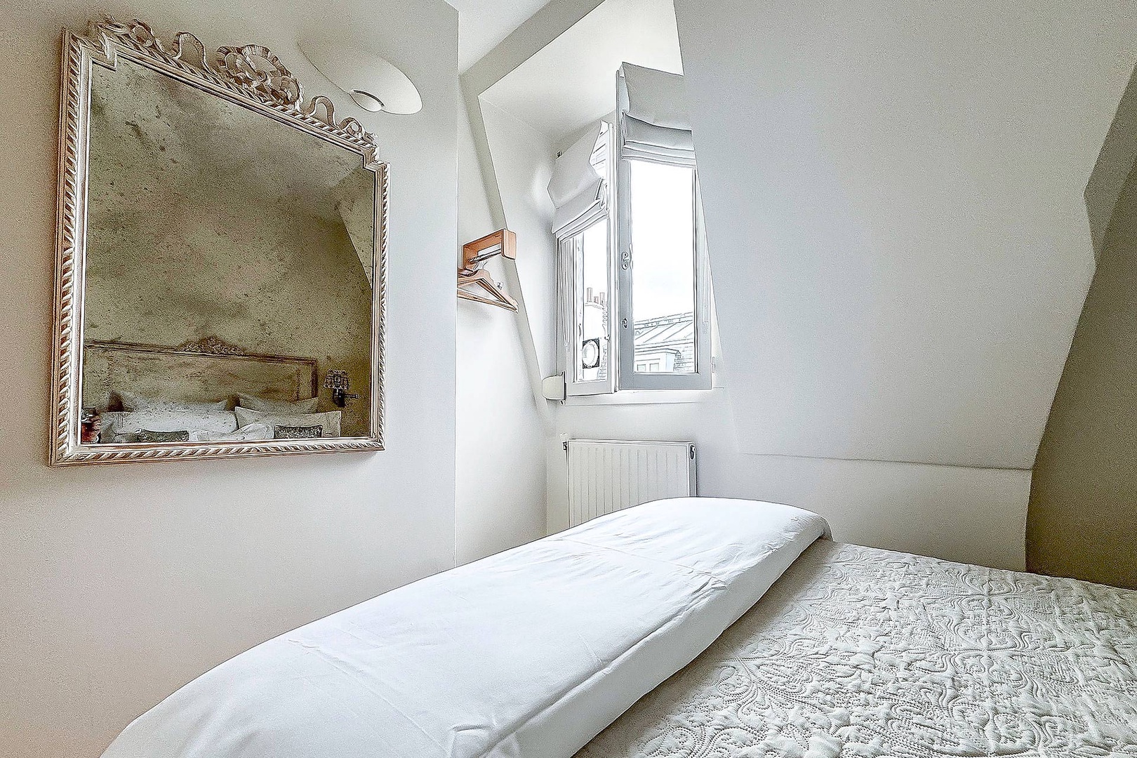 Lovely antique mirror in the bedroom.