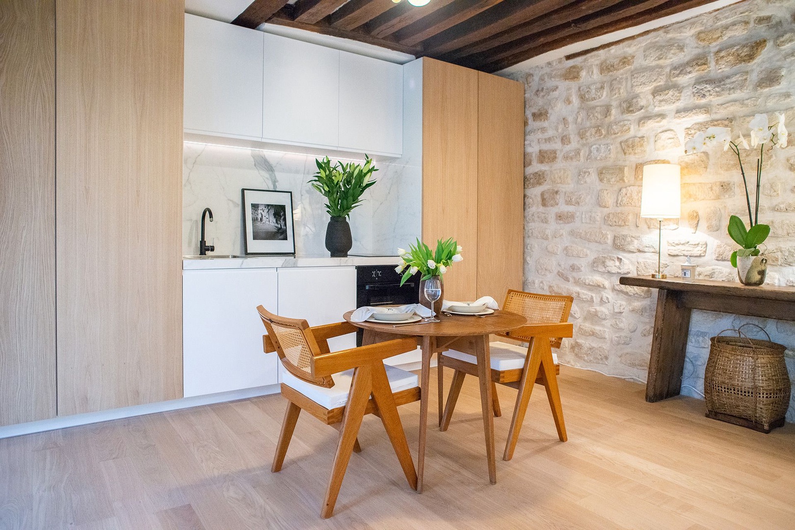 Have casual meals at home in your Parisian apartment.