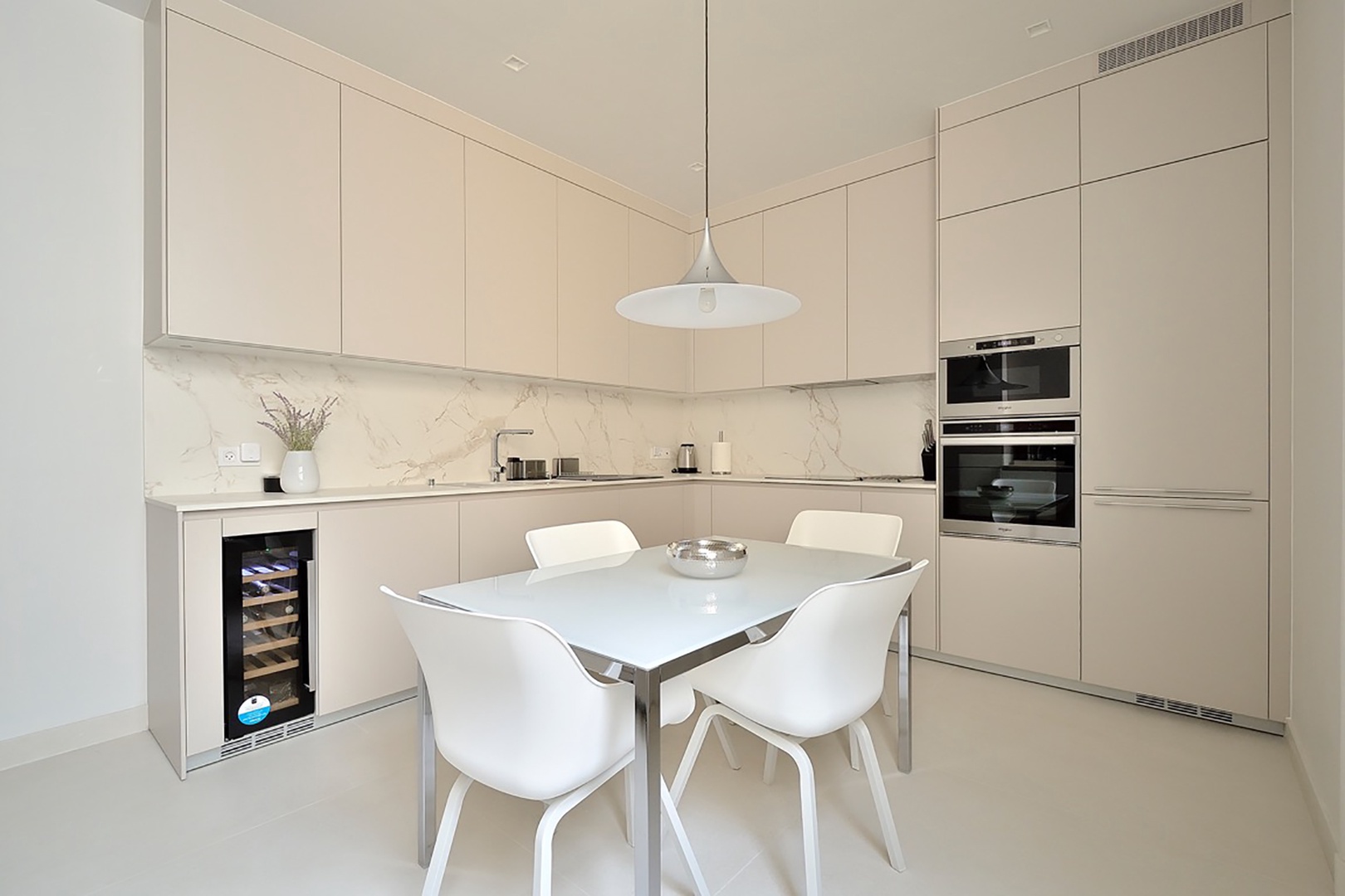 An additional dining area is conveniently located in the kitchen.