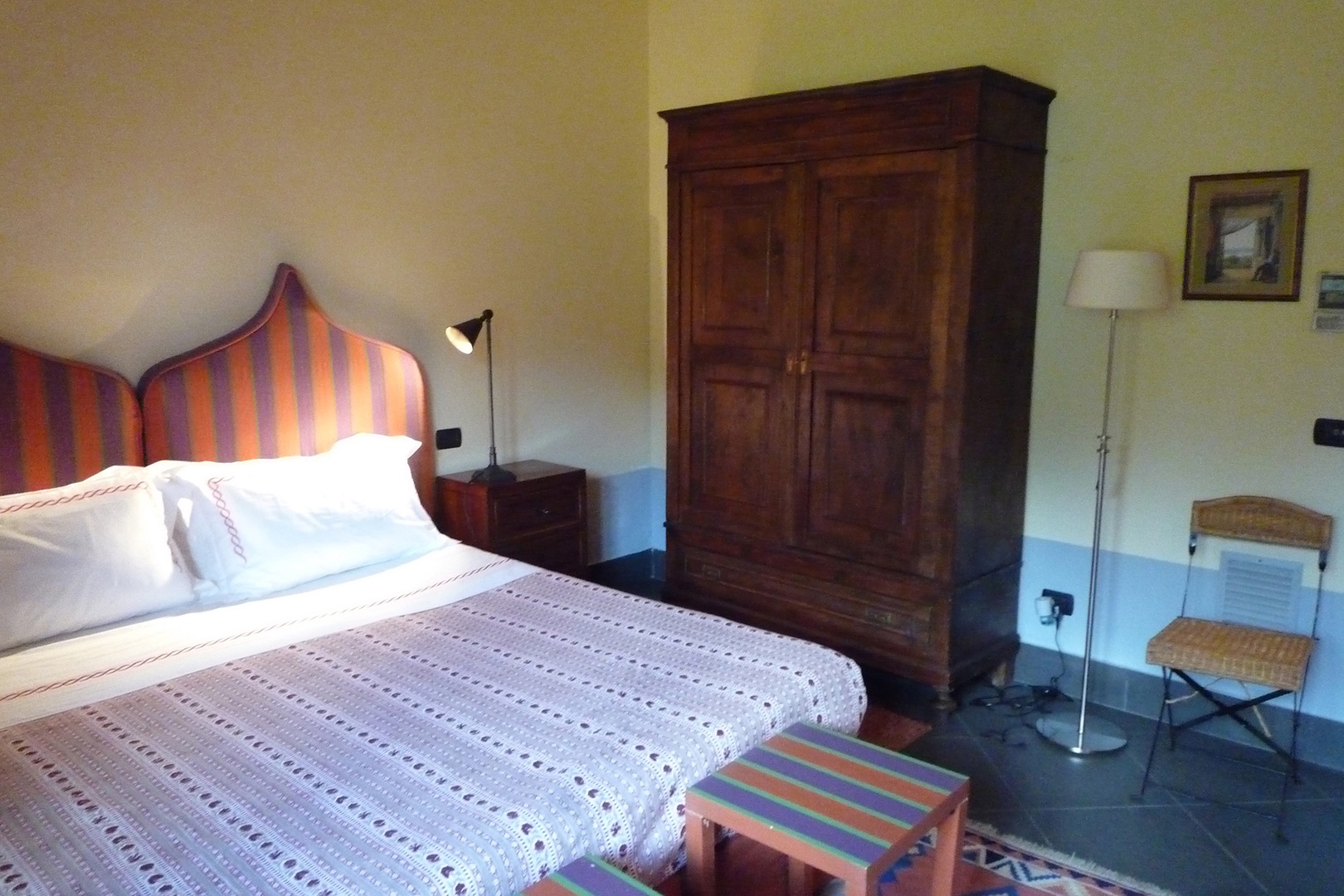 Large armoire in the bedroom.