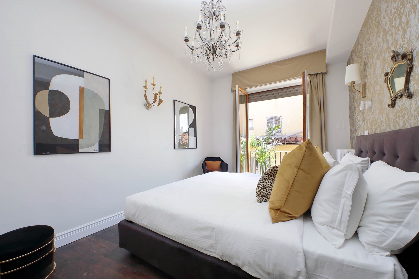 French doors in bedroom 1 lead to a small balcony.