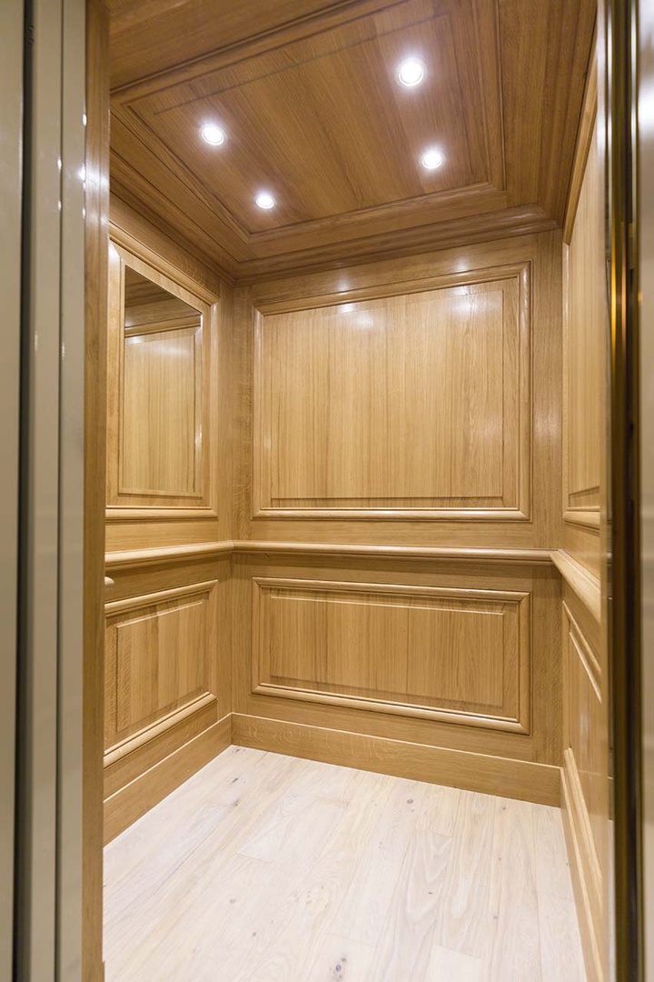 The modern elevator can accommodate 2 guest and 2 suitcases.