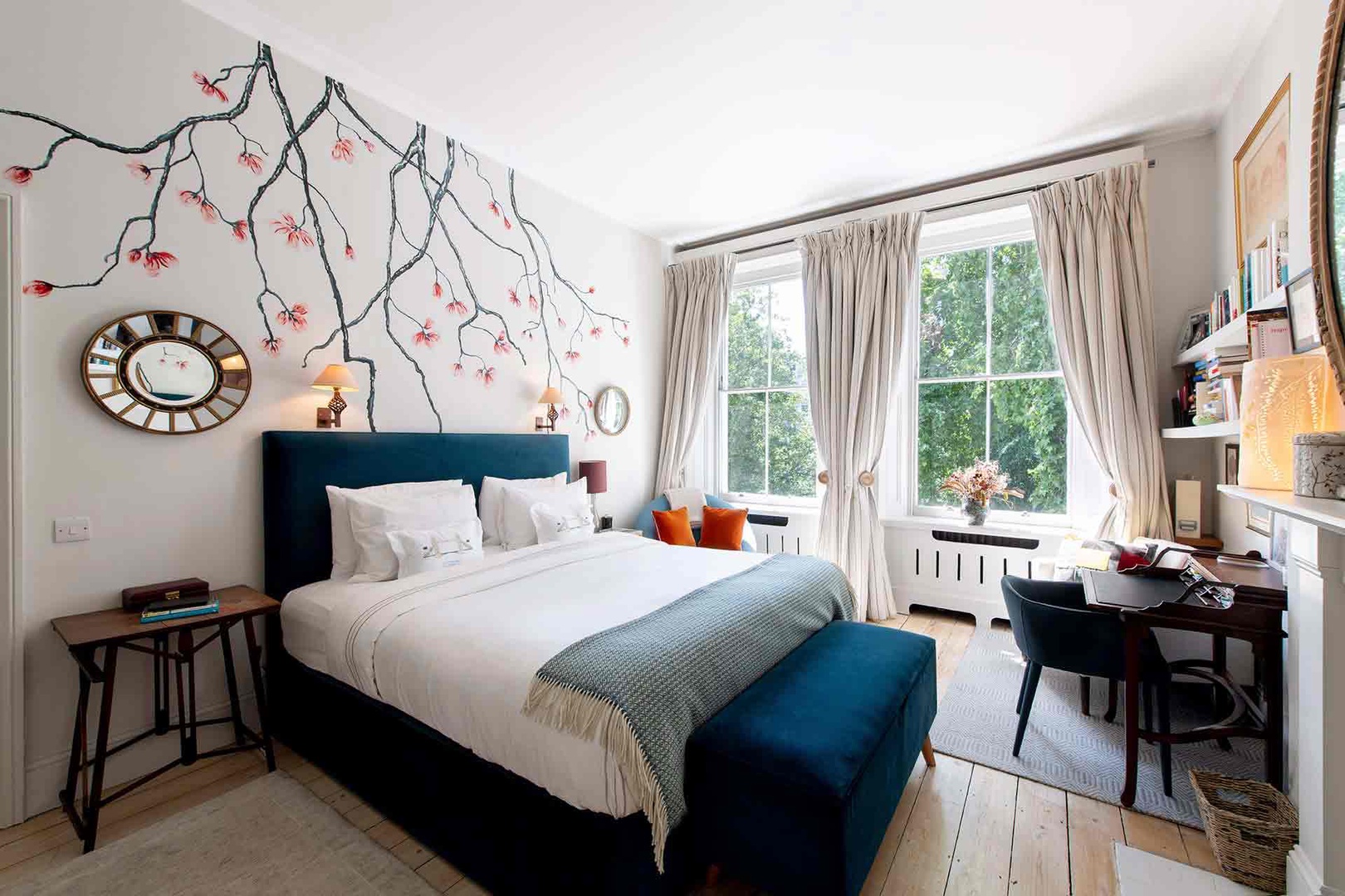 Stunning bedroom 1 with large windows.