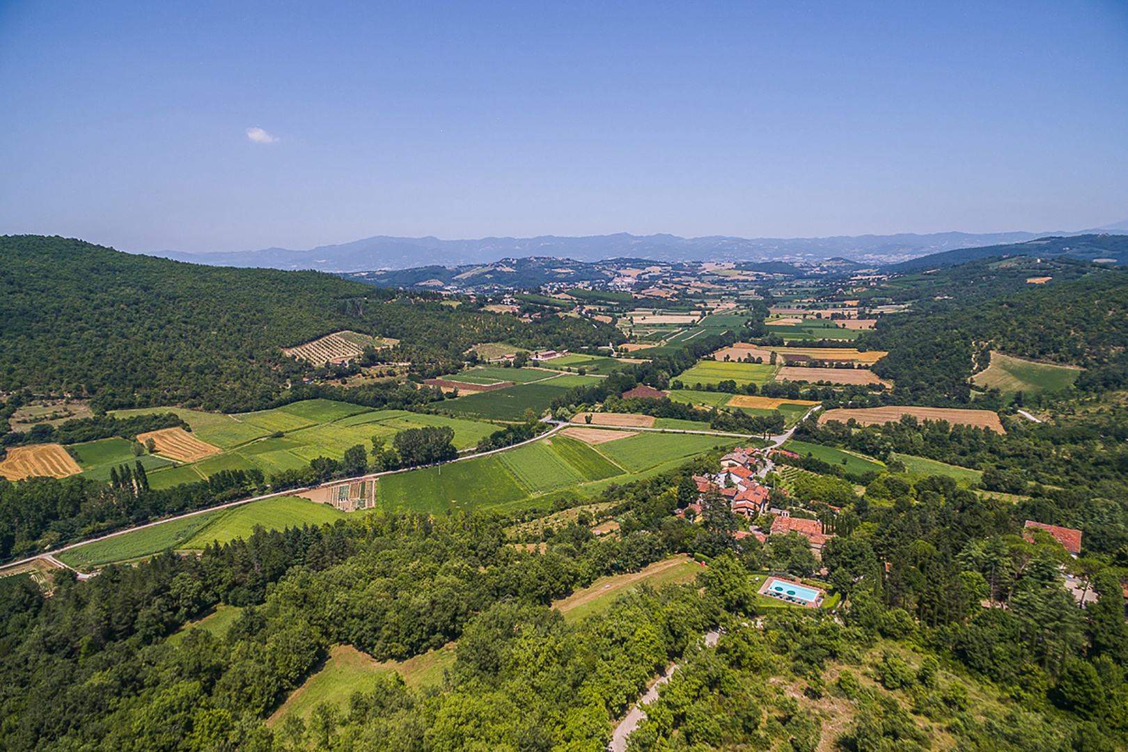 The pool in the foreground is of this villa. Lovely Tuscan hills and farms beyond.