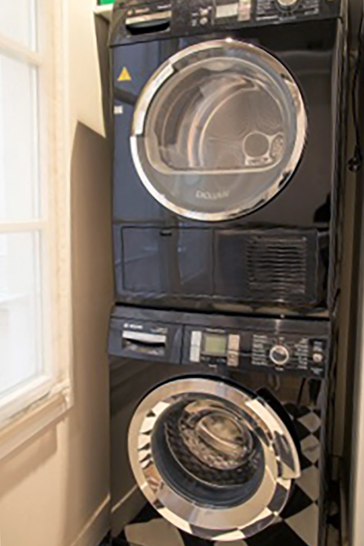 A separate washer and dryer is located in the laundry room.