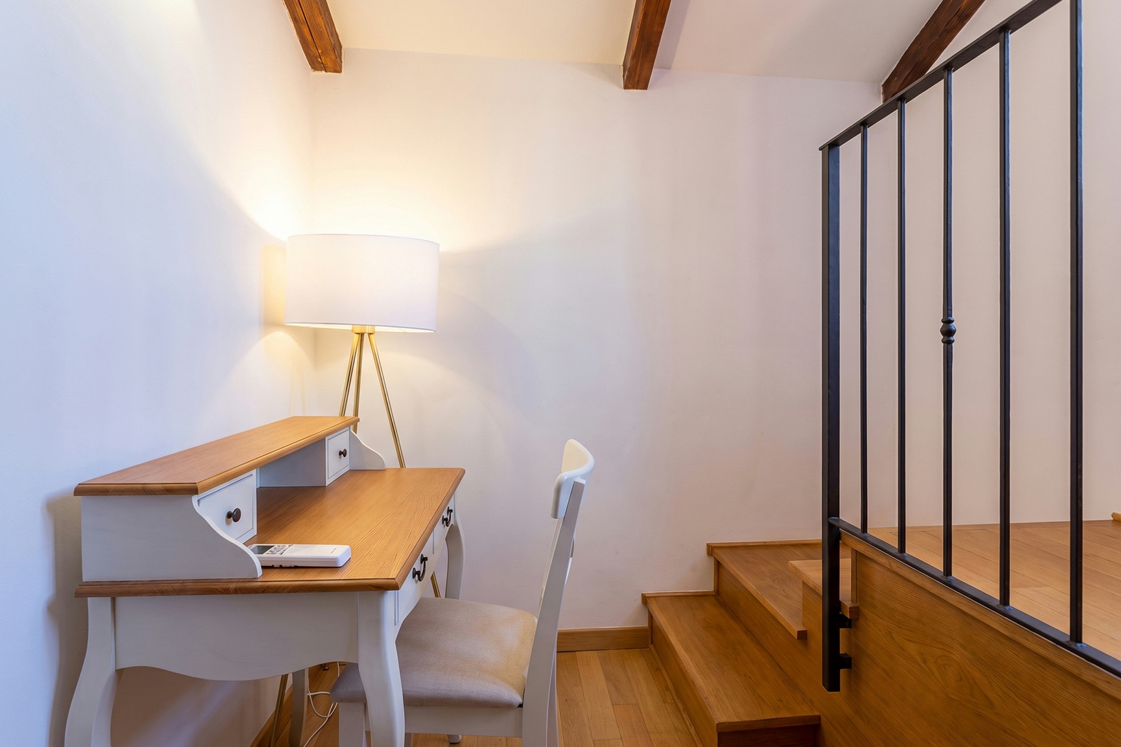 Desk in the studio offers a quiet place for remote work.