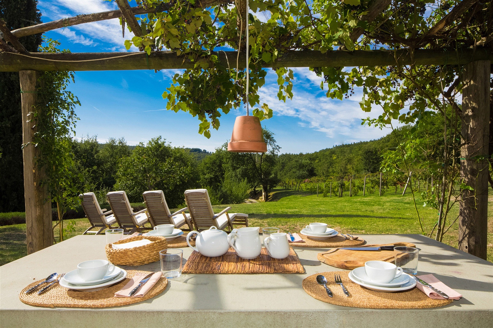 Breakfast outside on the terrace is a great way to start the day. The table seats up to 14 people.