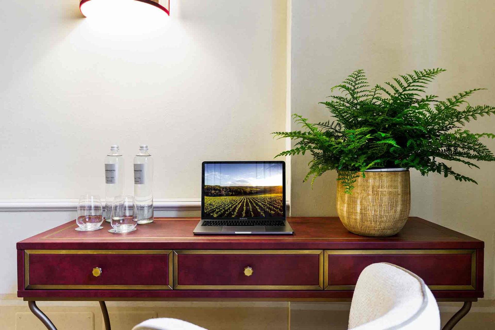 Settle into your stylish workspace with a sleek desk,