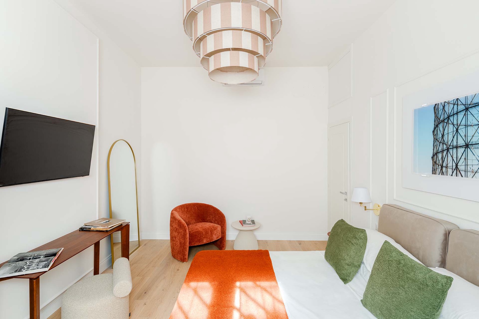 Armchair and table make this space functional and comfortable.