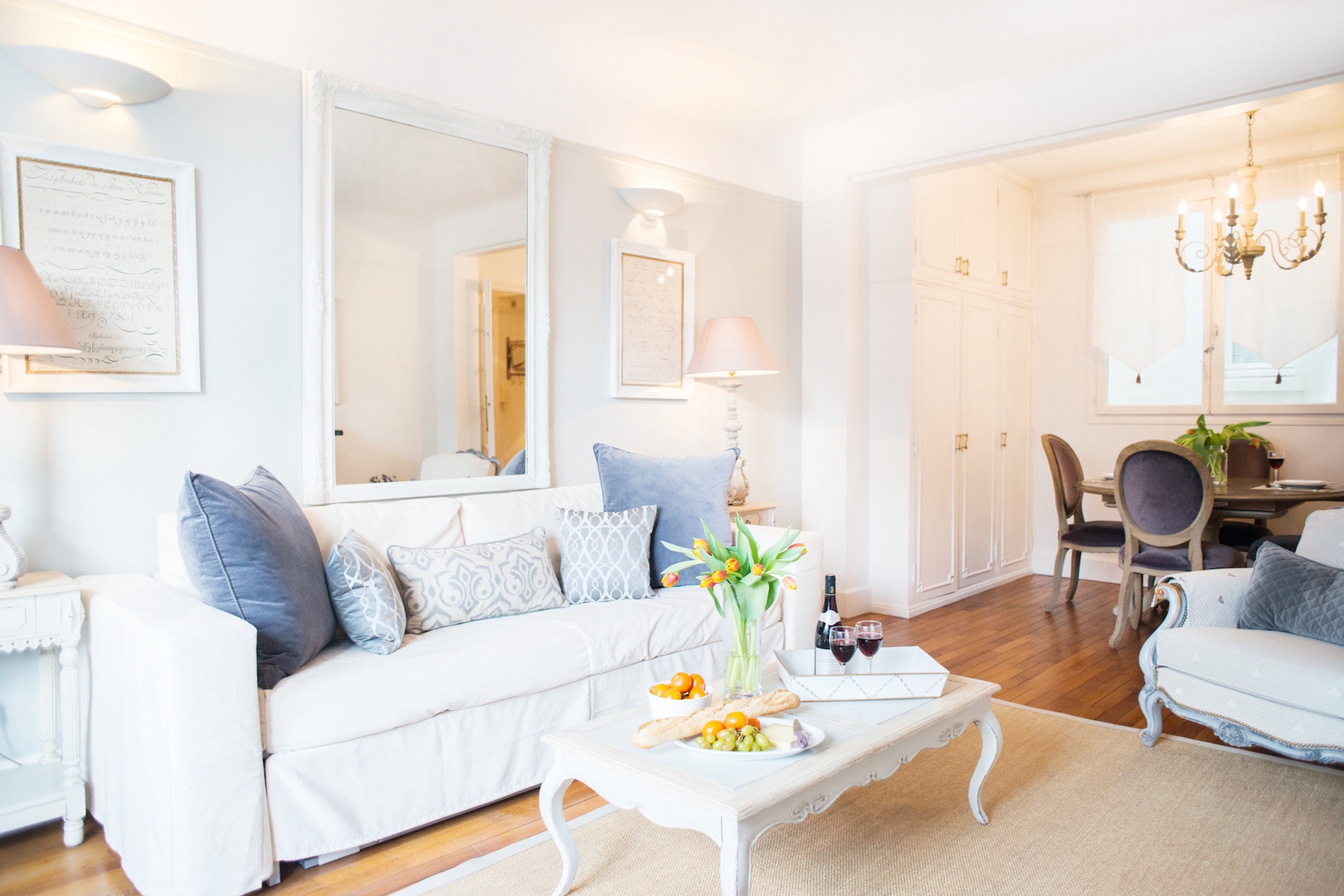 The living room with an open-plan dining area has an airy feel.