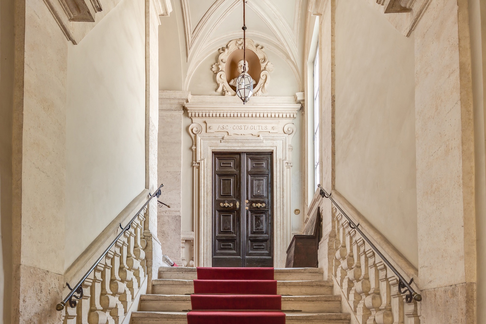 Beautiful formal staircase leading you to your apartment.