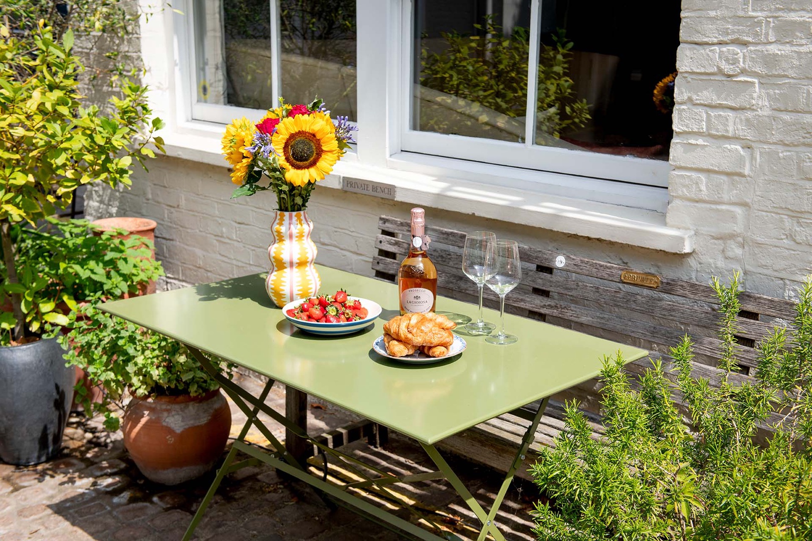 Enjoy sunny day dining outdoors on the mews.