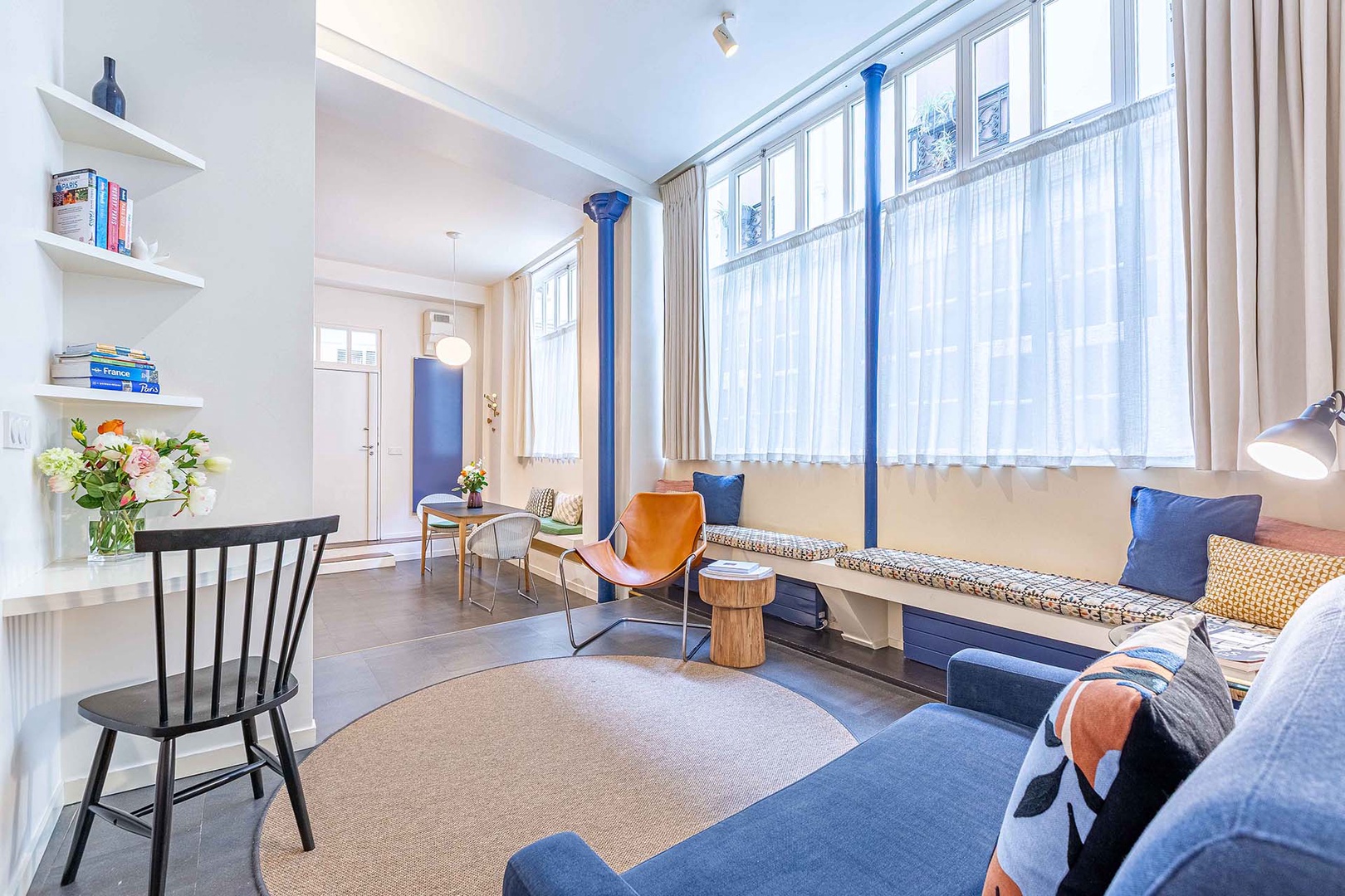 High ceilings and large windows create a lovely spaciousness.