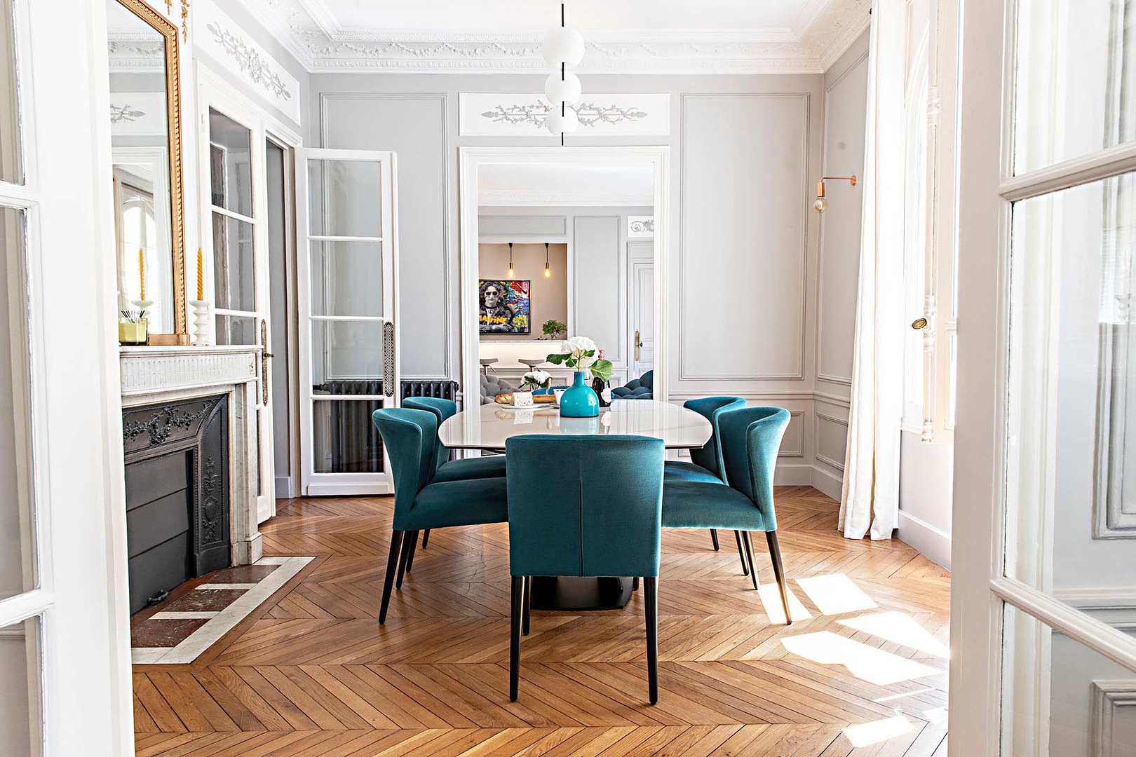 Elegant dining room located next to living room.