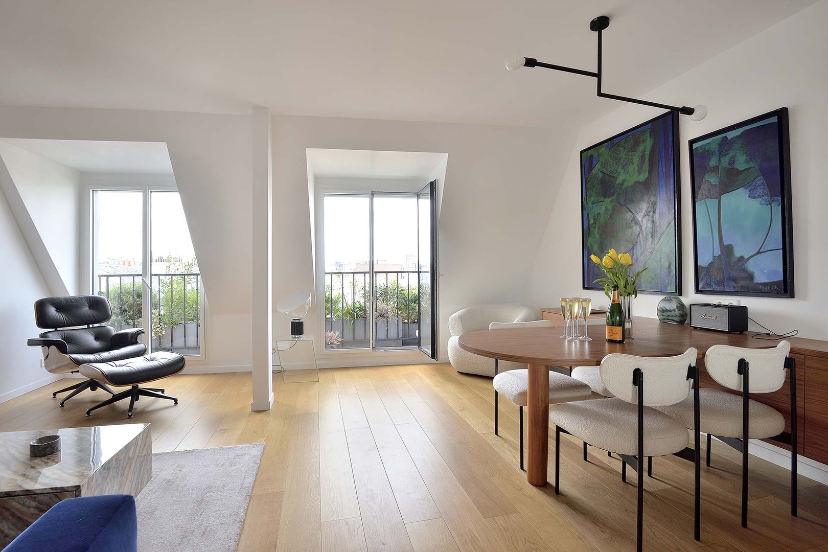 Large French windows fill the space with light.