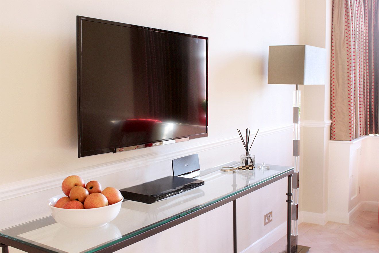 Living room with flat screen TV and DVD player