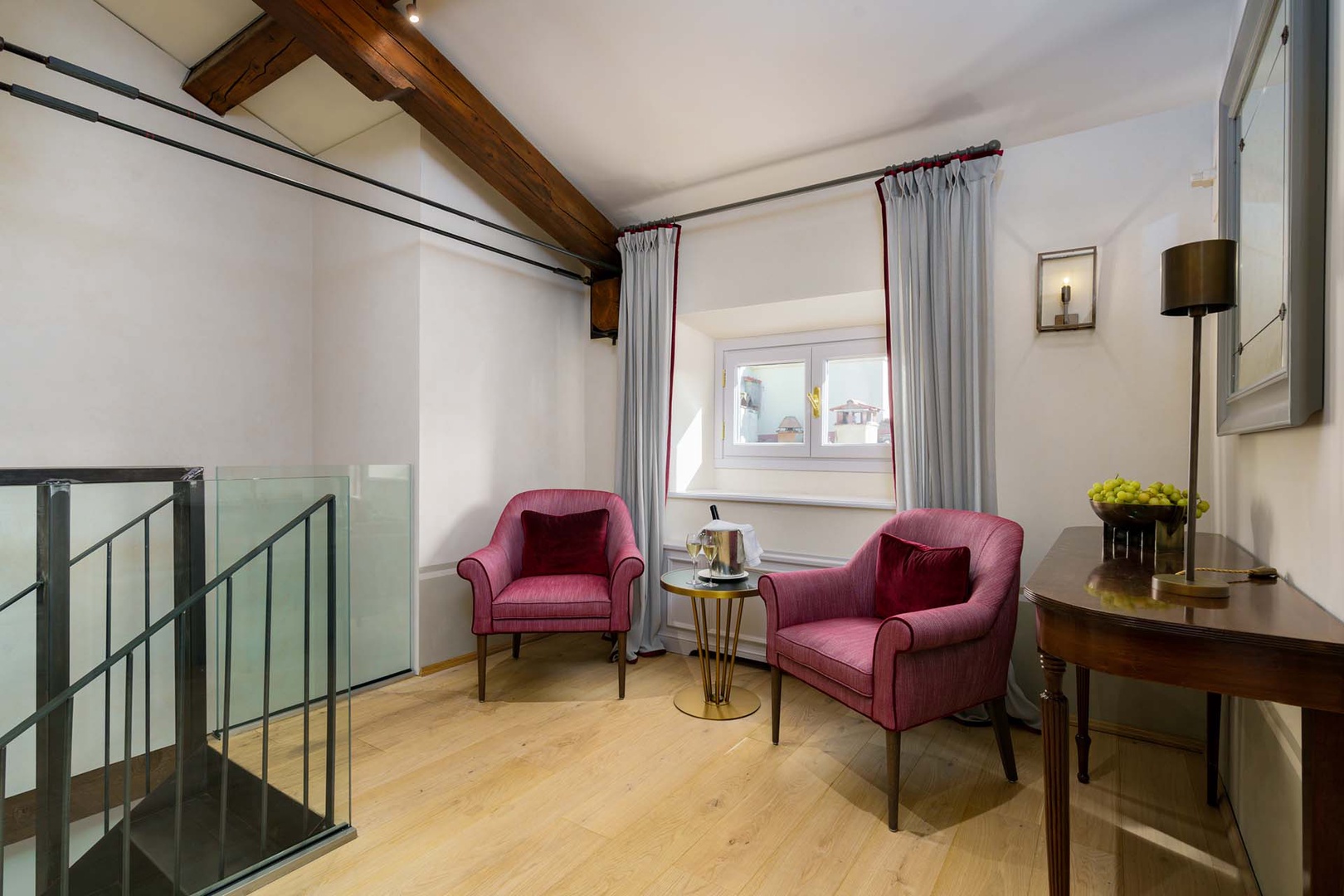 Charming seating area on the upper bedroom level.