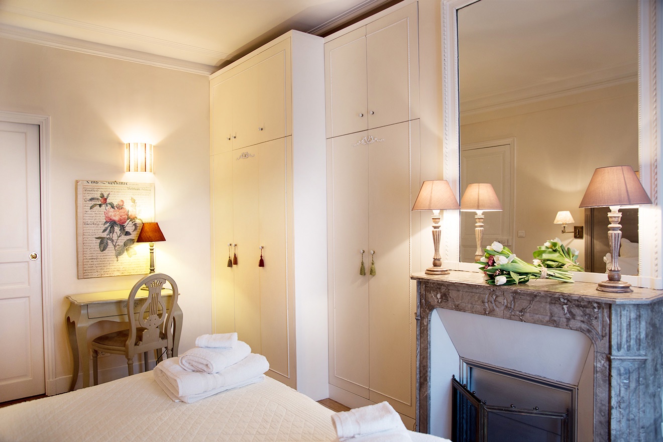 You will love the floor-to-ceiling closets and a stunning marble fireplace.