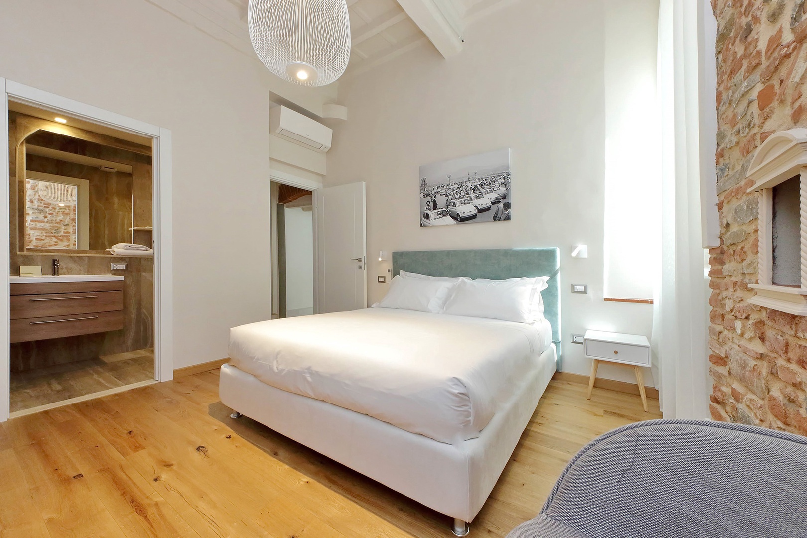 Bedroom 1 is spacious with high ceilings.