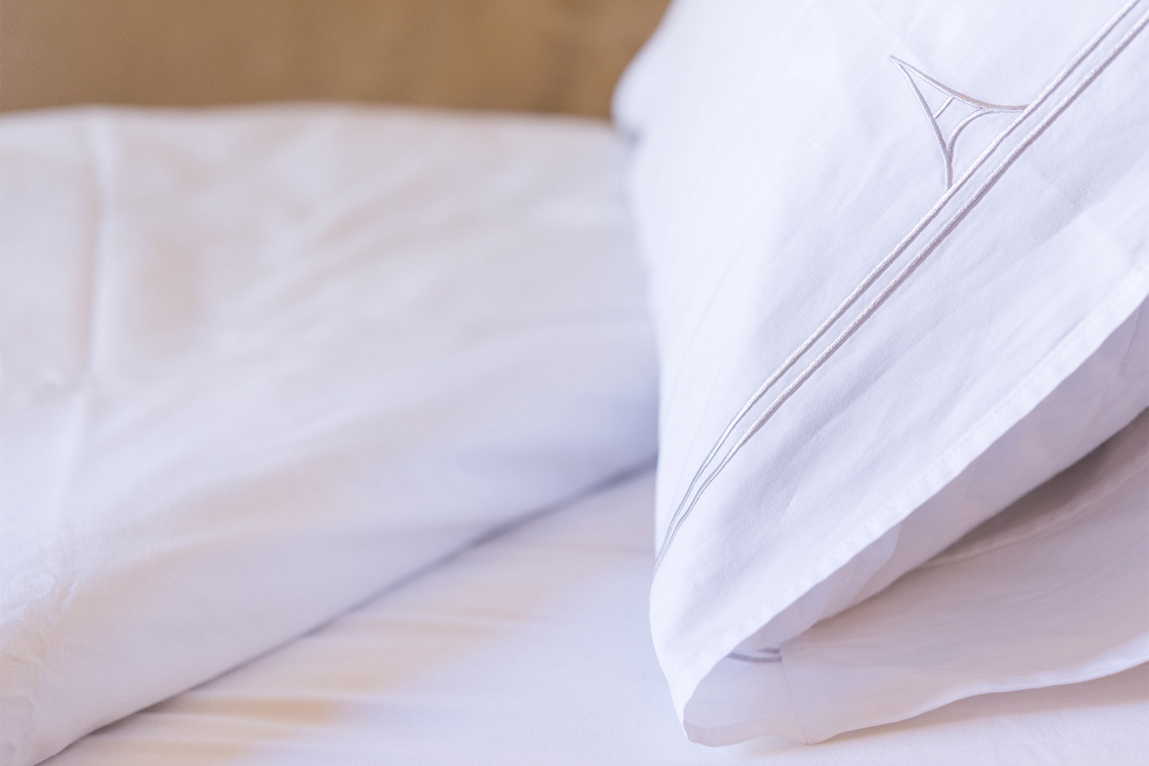 The beds are made with our luxurious custom linens.