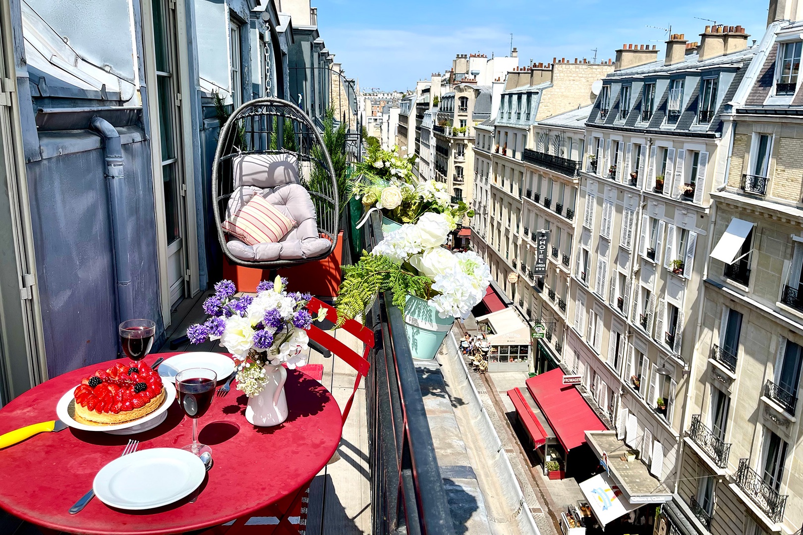 Sit outside on the sunny balcony of our Saumur apartment!