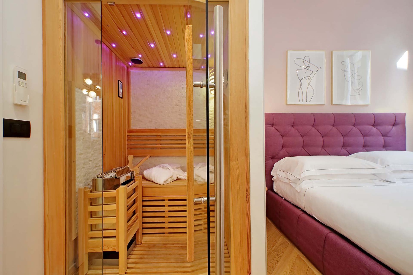 Spa like experience in bedroom 1 with a sauna and jaccuzi tub.
