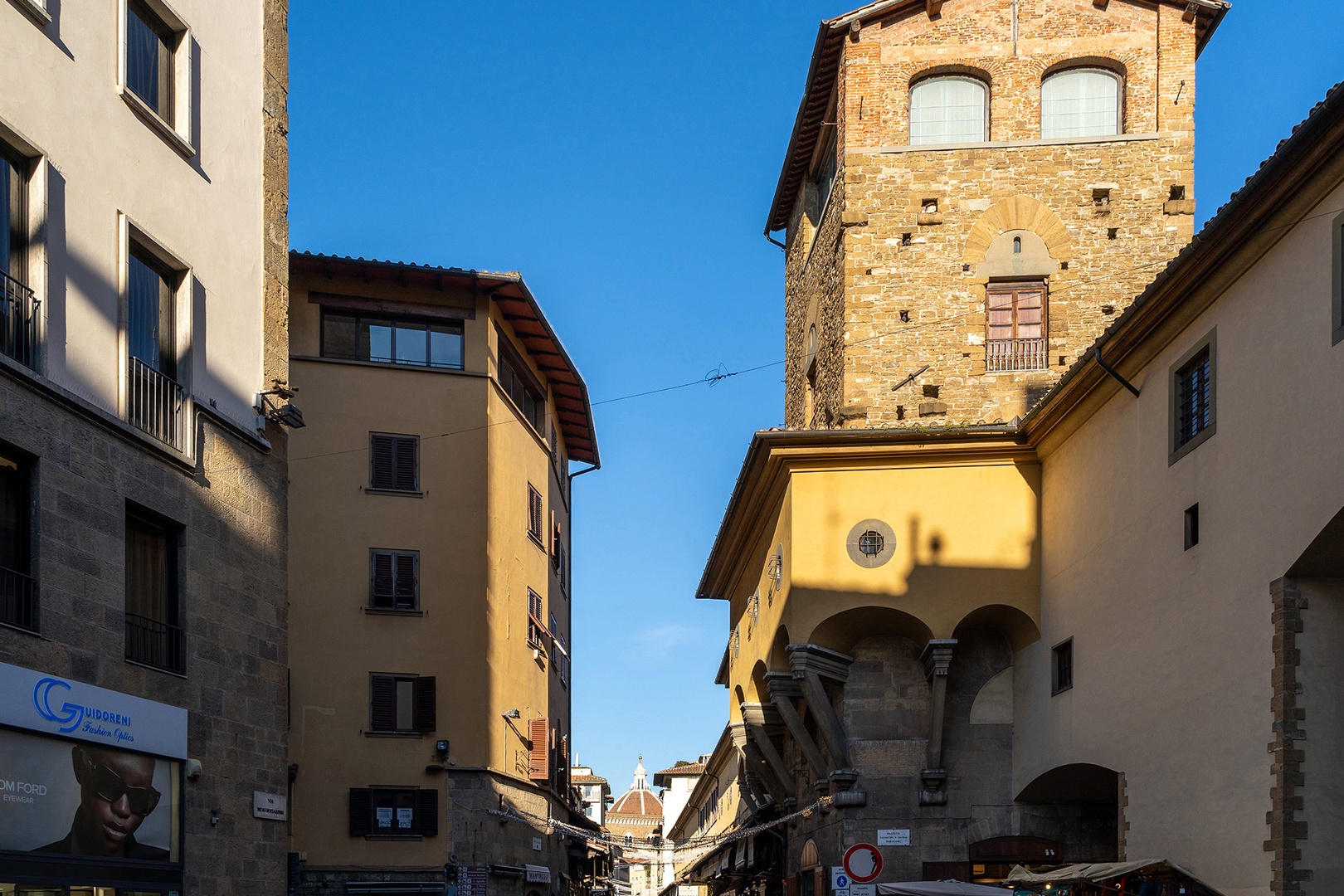 Look across the nearby Ponte Vecchio towards the Duomo.