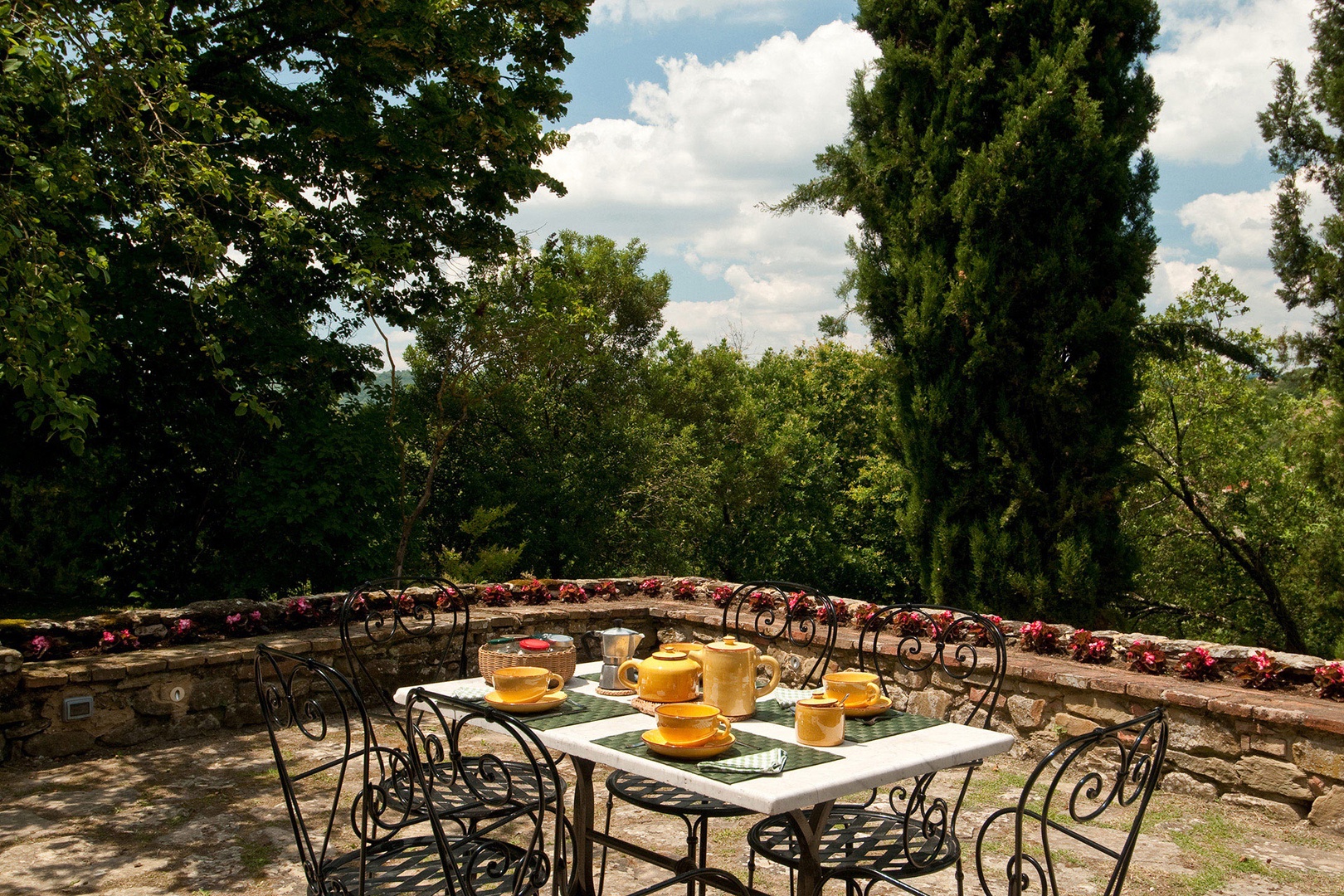 Large dining patio is a comfortable space for dining al fresco.