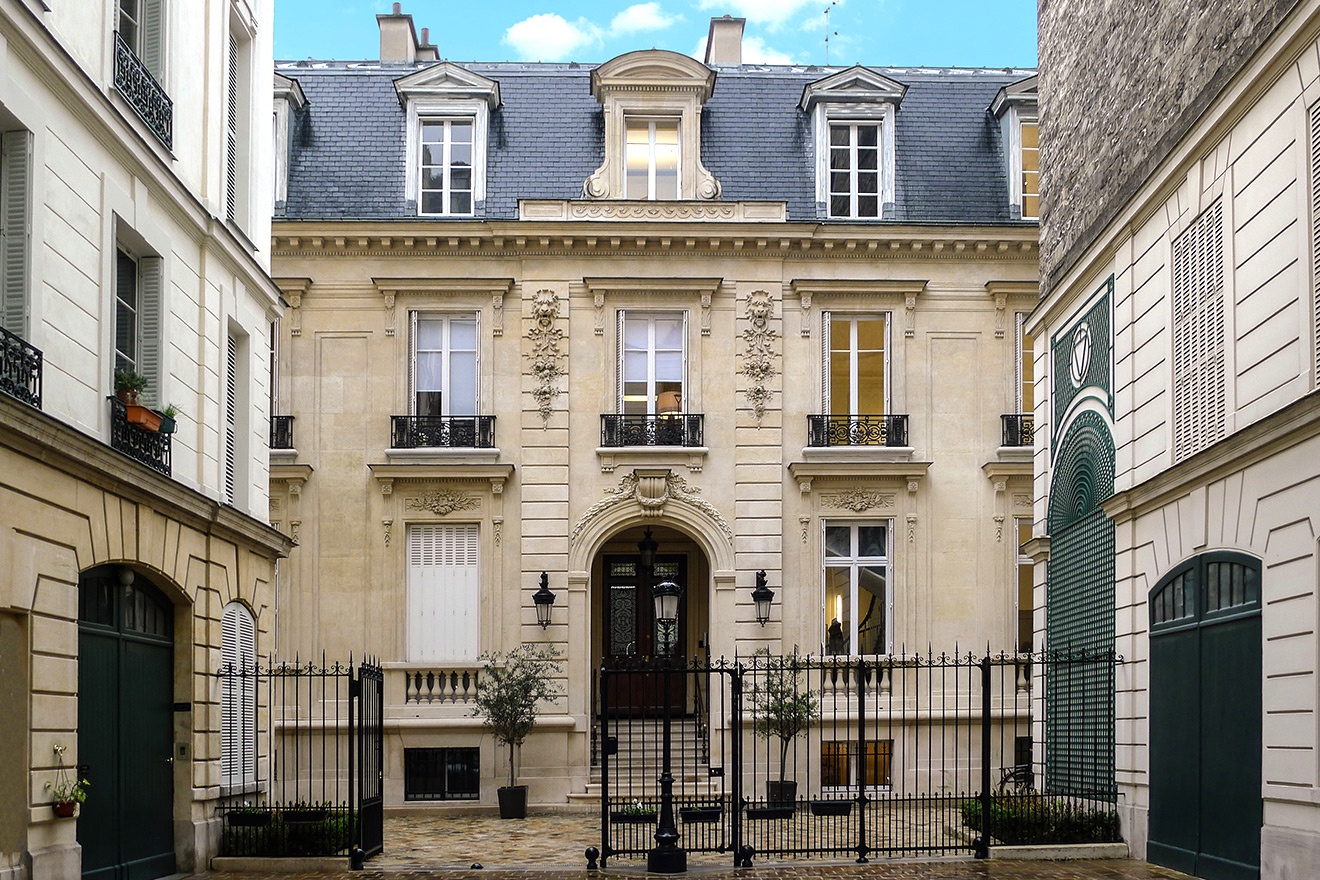 Walk through the grand entrance leading to a private chateau.