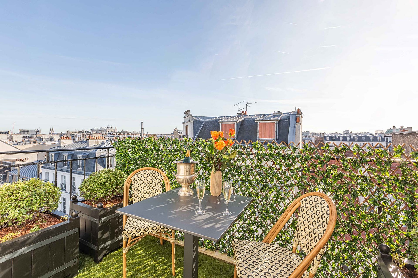 Sip champagne on your private balcony off of the living room, with panoramic city views.