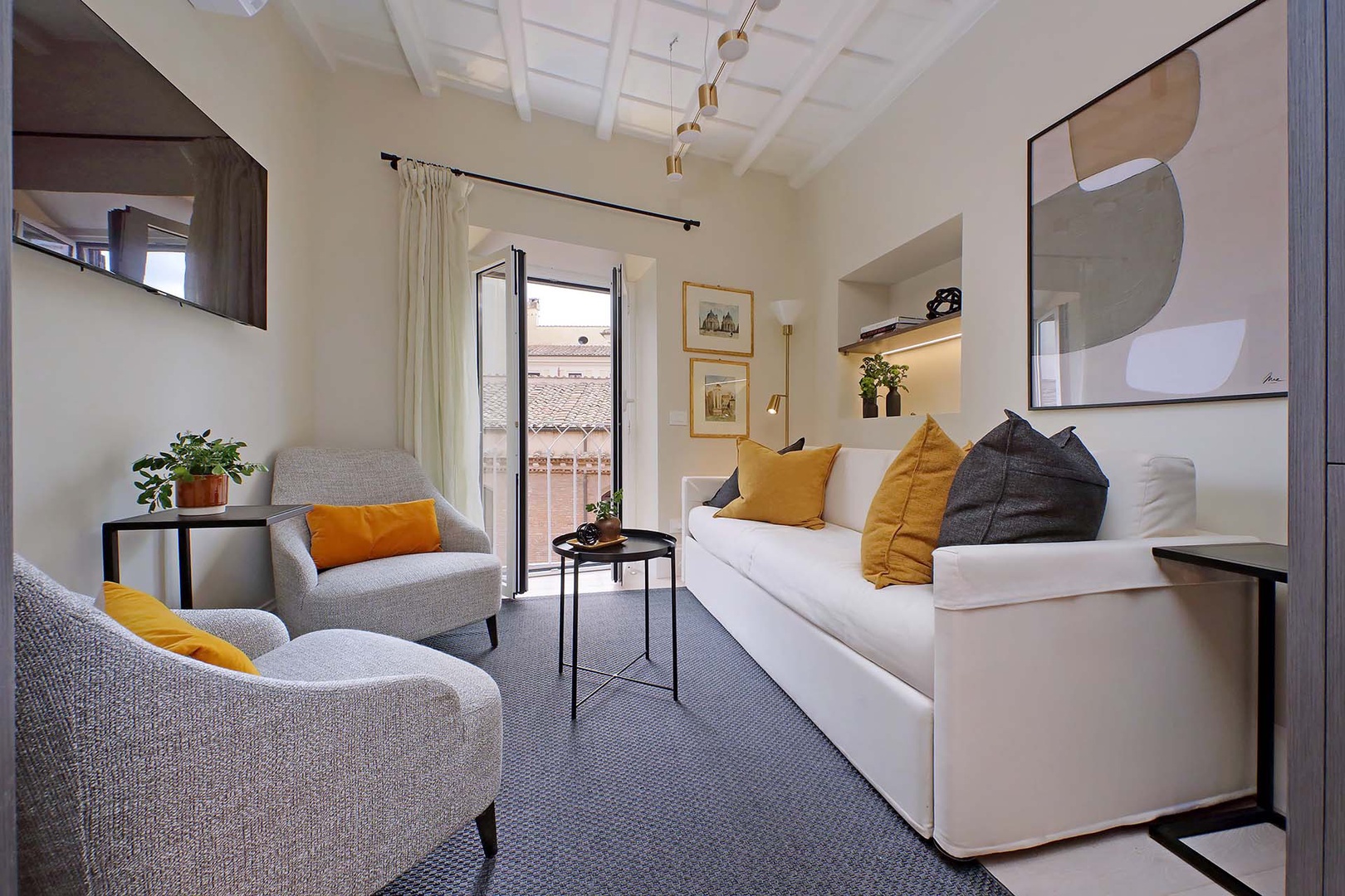 Charming living area with original beamed ceiling.