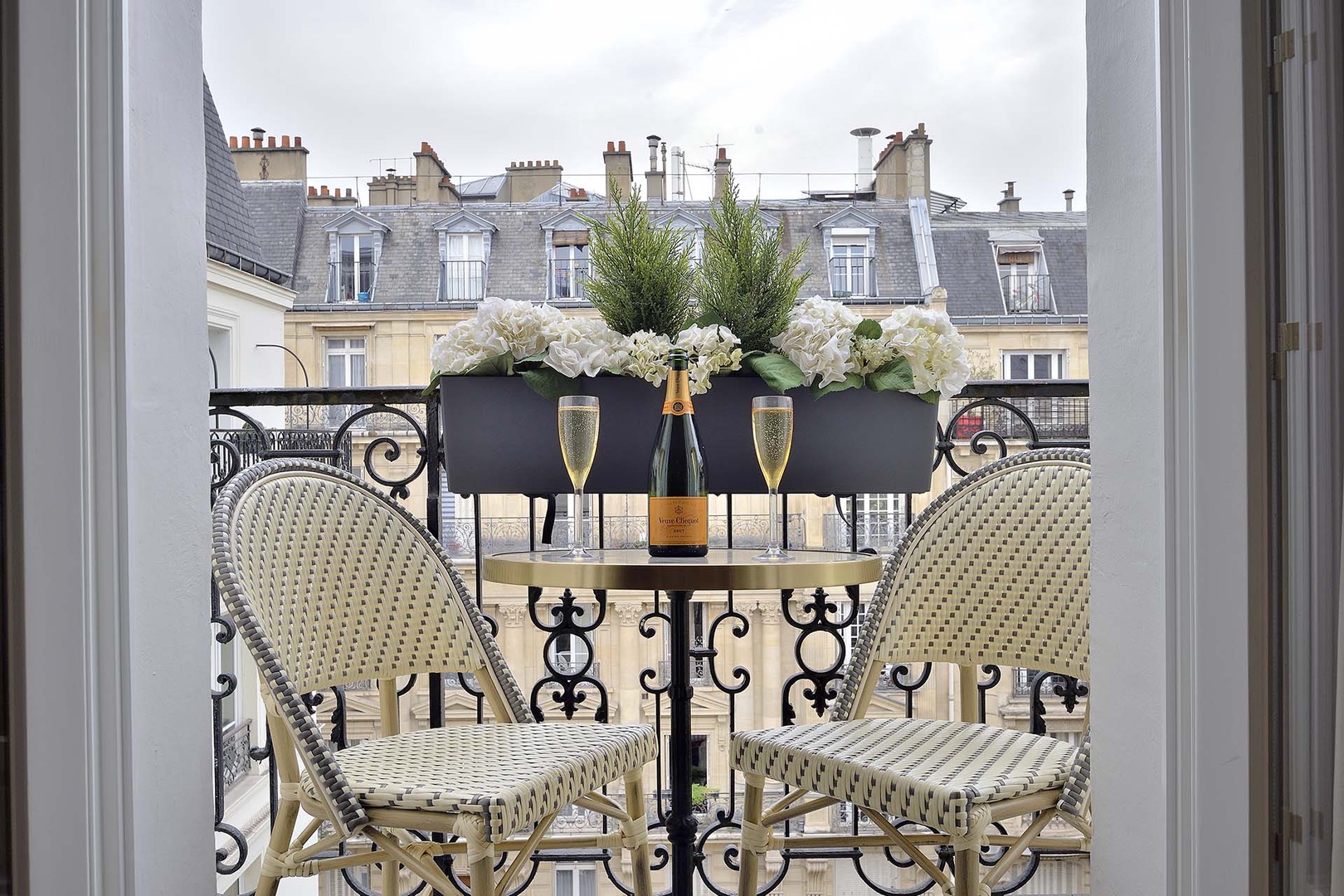 Enjoy charming moments relaxing on the balcony.
