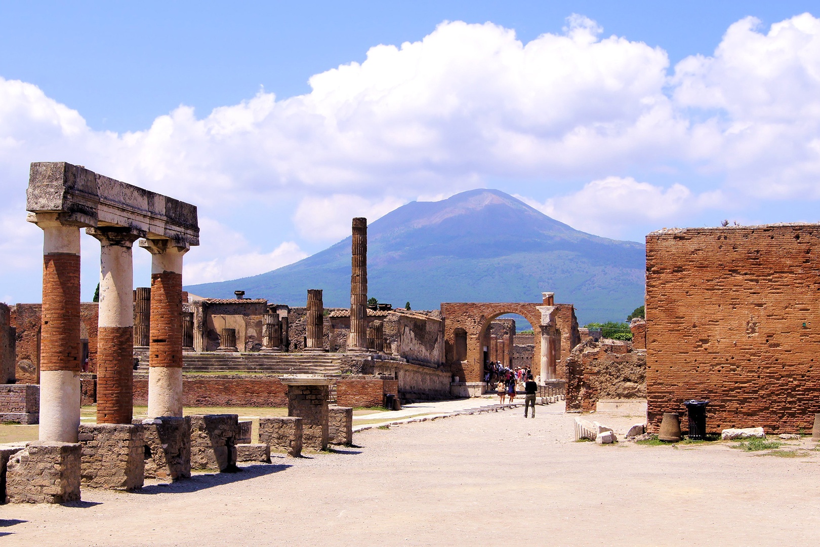 Explore the ancient ruins of Pompeii.