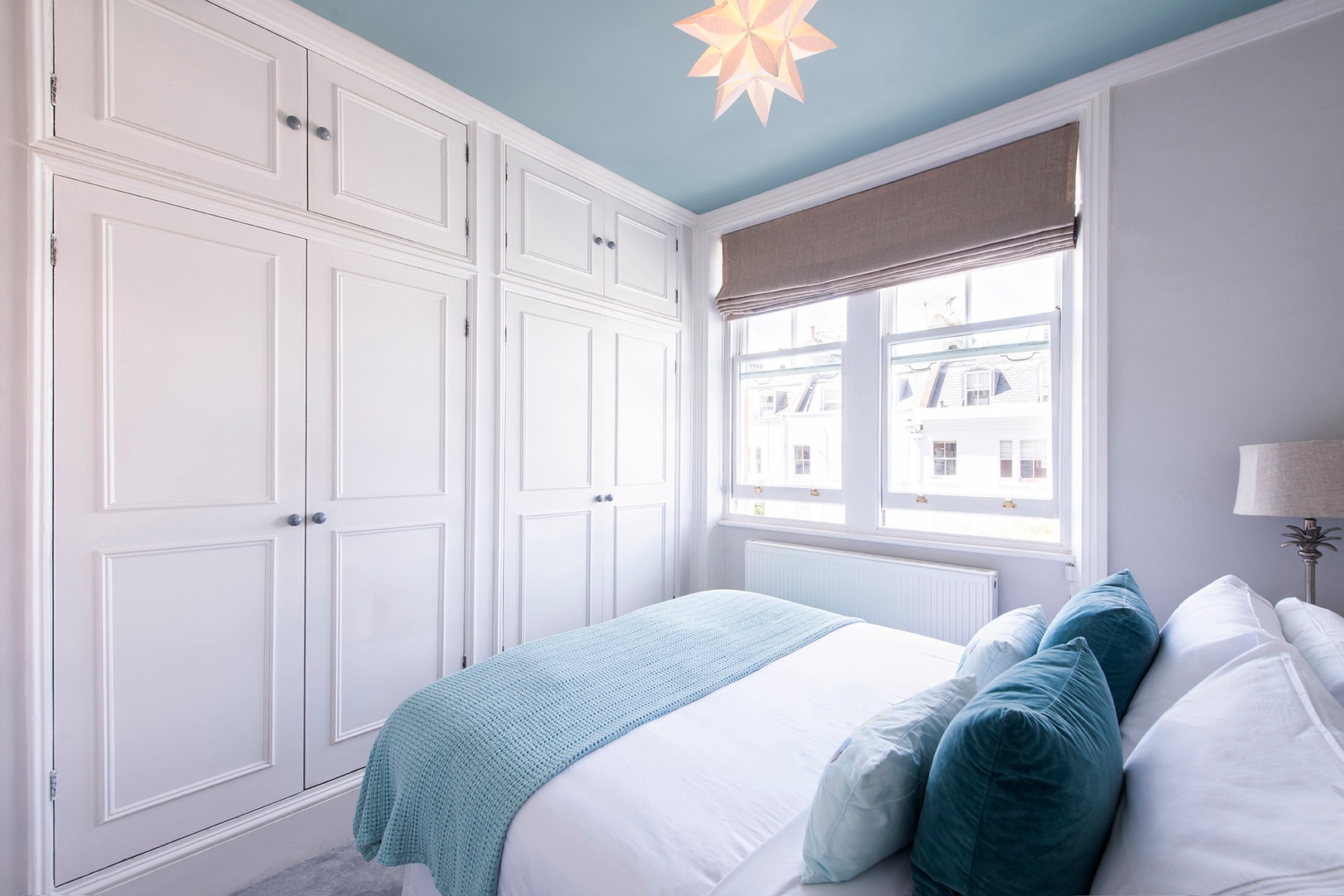 Floor-to-ceiling wardrobe in the starlit bedroom.