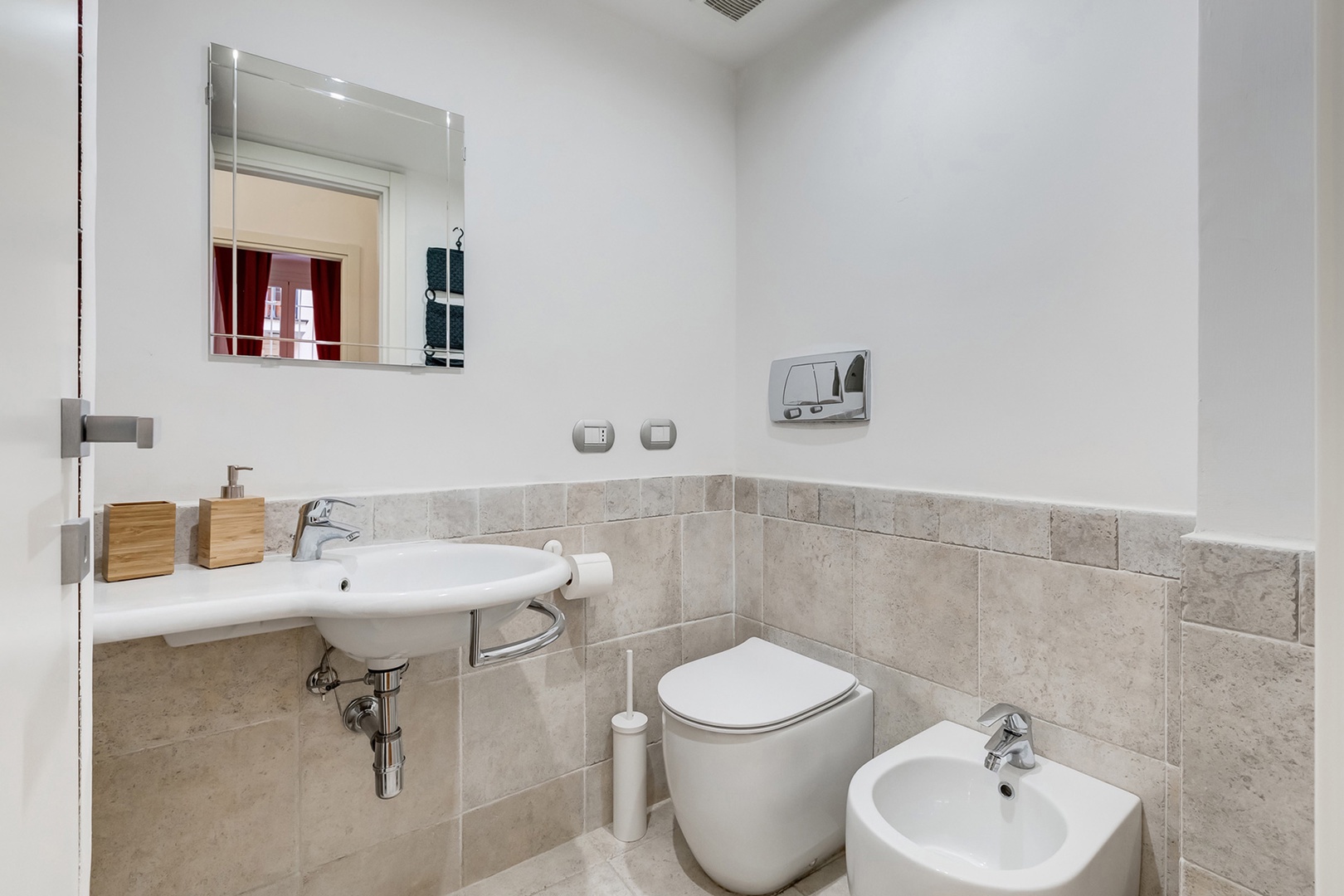 Full bathroom with shower, sink and toilet