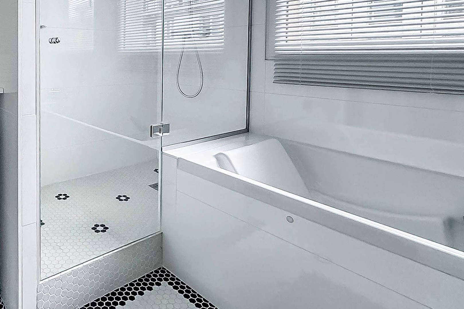 Bathroom 2 features a shower and bathtub.