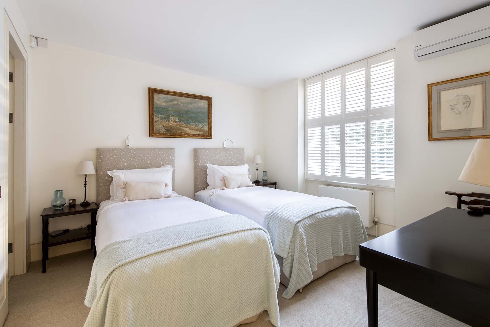 Bedroom 2 has large window and en suite bathroom.