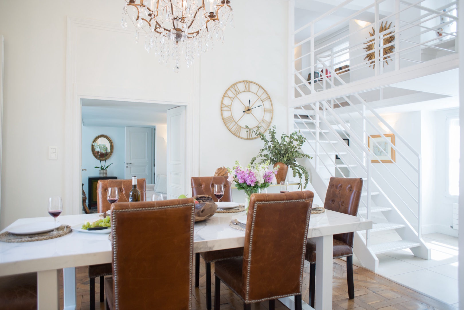 View from the dining table towards the staircase leading to the second level