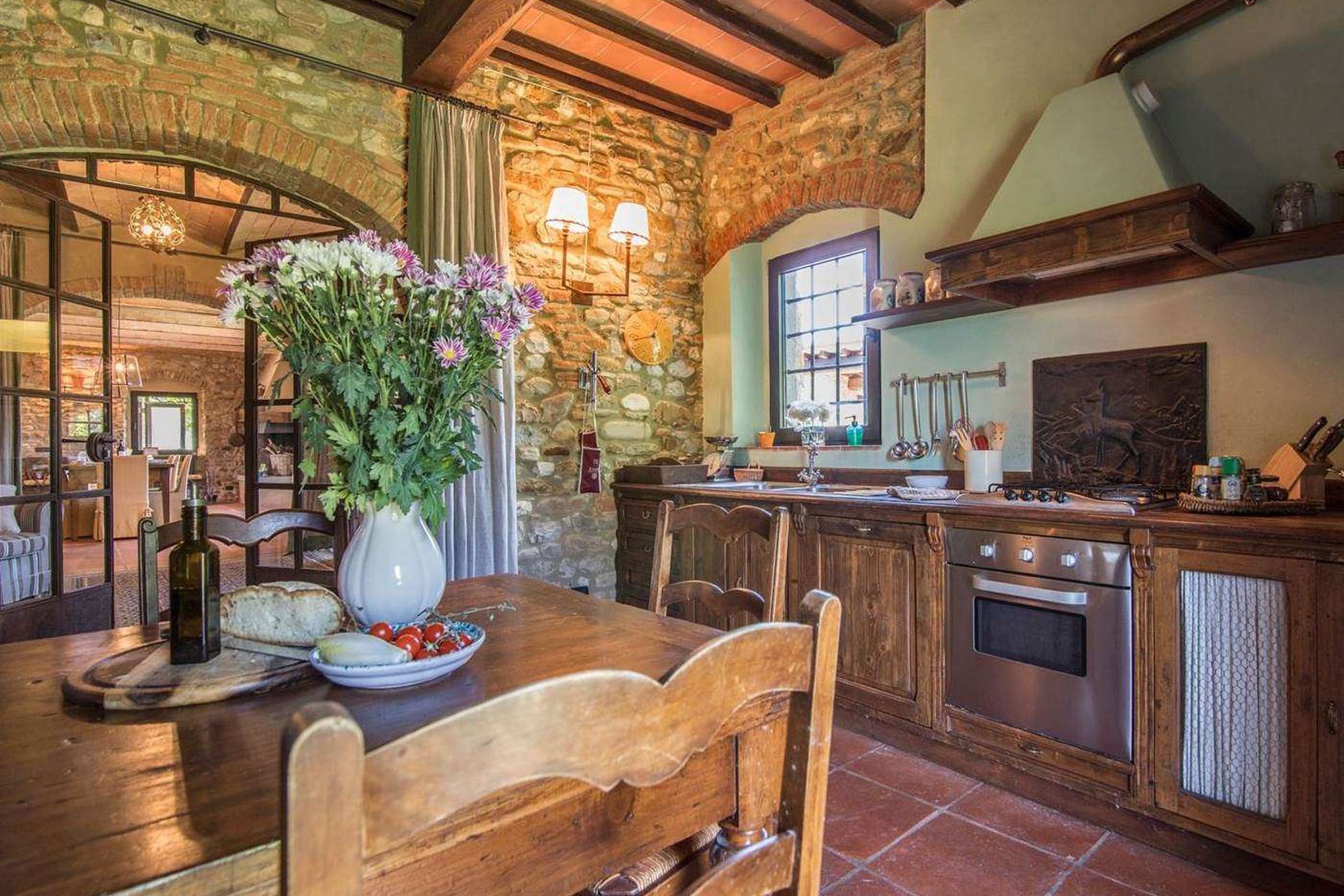 Kitchen is full of character and fully equipped for cooking at home.