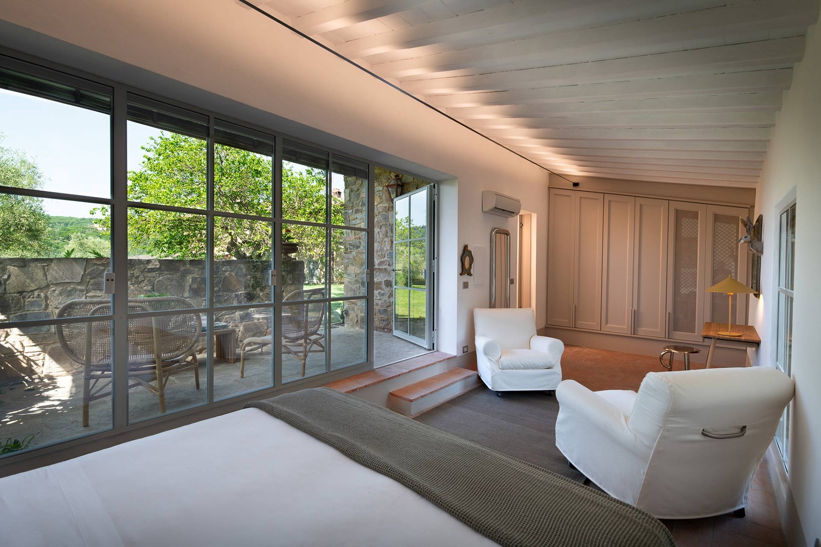 Light filled bedroom opens onto the patio.