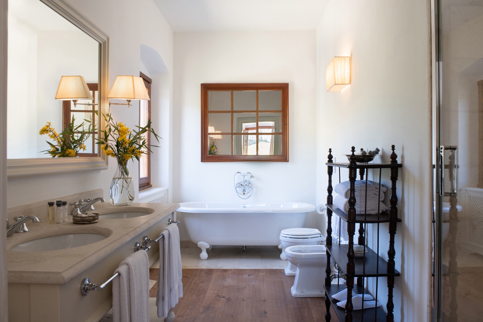 Ground floor bathroom has charming tub as well as step in shower.