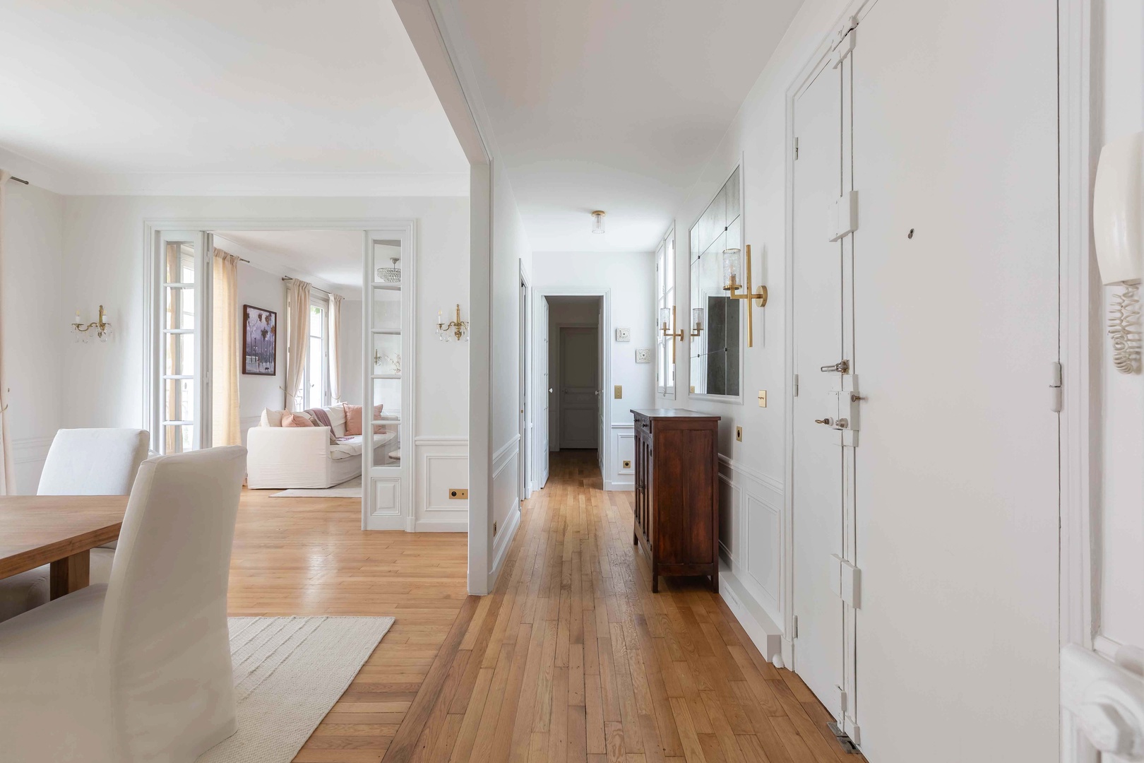 Spacious hallway leading to bedrooms.