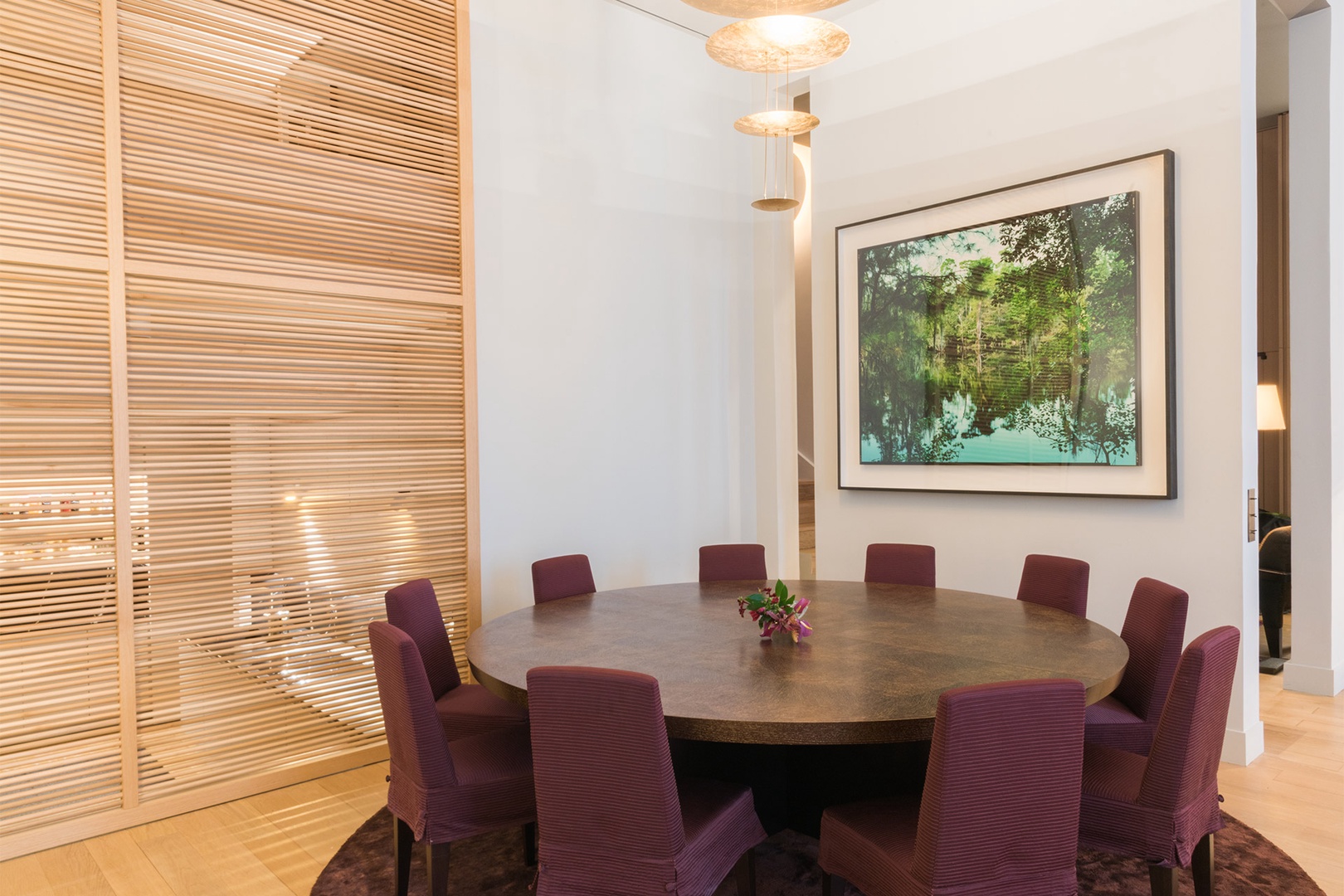 A wooden sliding door can close off the kitchen.