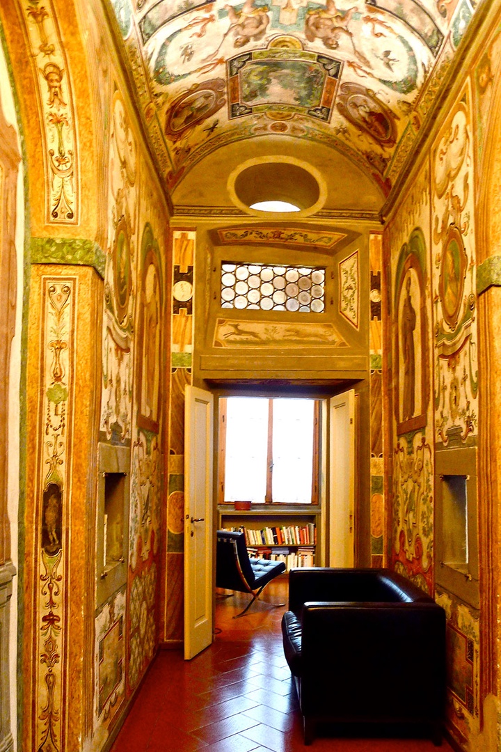 Rich, original frescoes in entry hall.