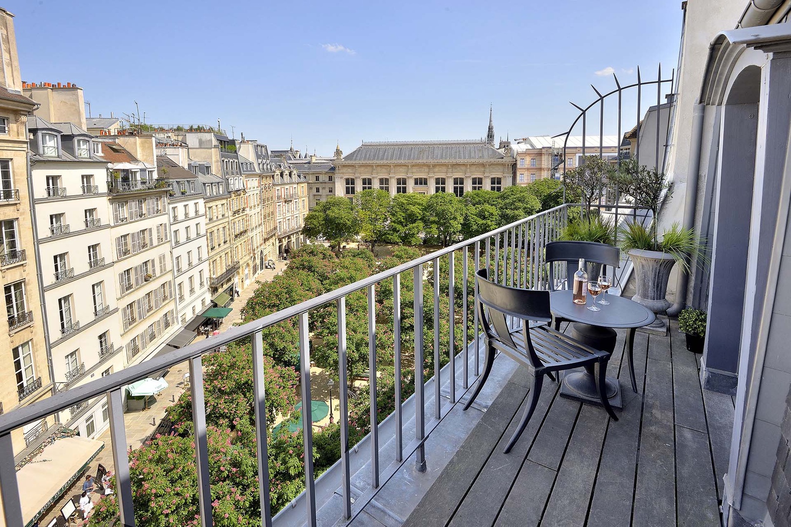Enjoy your private balcony with a beautiful view of Place Dauphine !